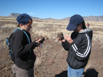 Searching for mantle nodules at a field site in the volcanic field.