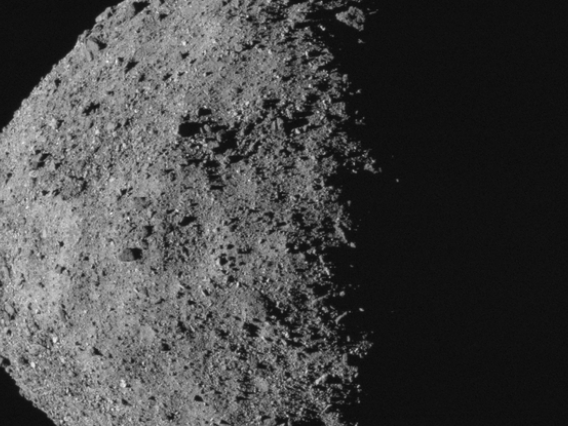 This image, showing asteroid Bennu's spinning-top shape, was taken by the MapCam camera on NASA's OSIRIS-REx spacecraft on April 29, from a distance of 5 miles. From the spacecraft's vantage point, half of Bennu is sunlit and half is in shadow. (Credit: N