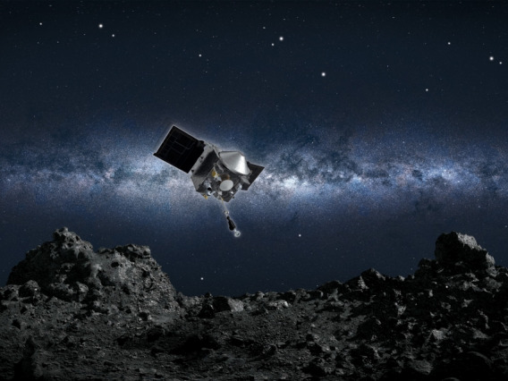 Artist’s conception of NASA's OSIRIS-REx spacecraft collecting a sample from the asteroid Bennu. NASA/Goddard/University of Arizona