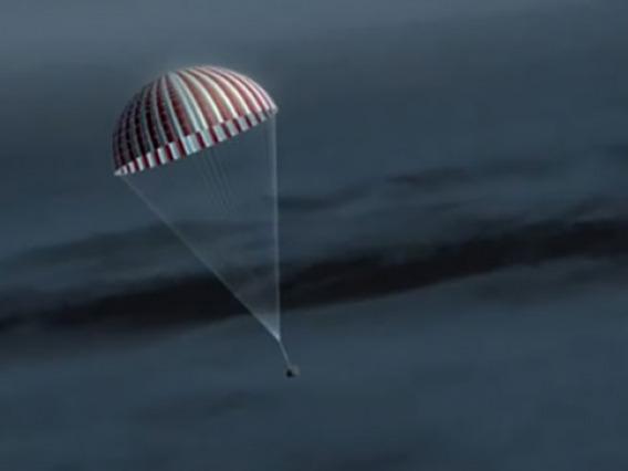 OSIRIS-REx sample capsule parachutes down to Earth.