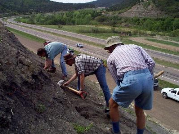 Once Dave pointed it out to us, we sent some people down the slope to dig out a ledge for us.