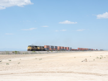 A train traveling through the desert on the way to the forest and hills of Chiricahua National Monument. Image by Harry Tang