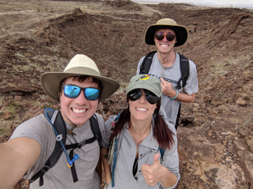 Adam, Laci, and Kyle next to Aden volcanic crater inside the shield volcano