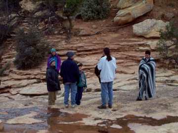Big Chief Hurfordt and Company have hiked down to the base of one of the natural bridges.