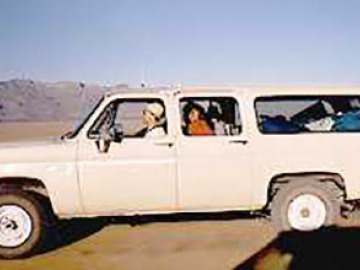 Gallop'n wild Bill Bottke speeds along the playa in the gedanken van.