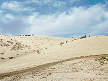 As the Colorado Plateau uplifted, volcanism was widespread along the rim where crustal thinning and crack formation occurred. This is part of one of the cinder-cone volcanic fields near the White Mountains.