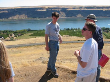 People overlooking the Columbia river.