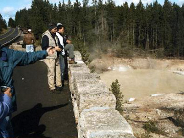 Overlooking Sulfur Cauldron, which is an enormous spring, roiling, loud, and definitely sulfurous in color and smell.