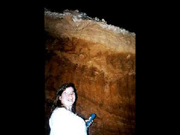 Although bats have not inhabited Slaughter Canyon Cave for 17,000 years, the thick layers of guano (bad droppings and remains) indicate that a large colony lived there for thousands of years. Barbara (5' tall) for scale.