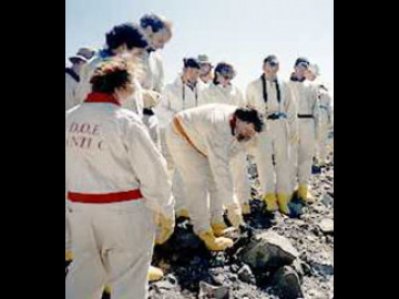 Jay shows that the melt glass (black stripe on rock) from the Danny Boy explosion is still incredibly radioactive.