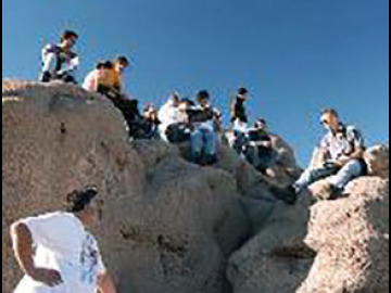 Joe gives us the history and geology of the area: the Salton Sea filled up and evaporated periodically throughout history, as the Colorado River delta silted up and caused the river to seek other drainage routes. In the early 1900's, the area was a playa with a town built on it when the river started flowing into it again. The present Salton Sea is what remains of that last flooding cycle, presumably with the town remains on its floor. Only evaporation is occurring now, and river engineering w