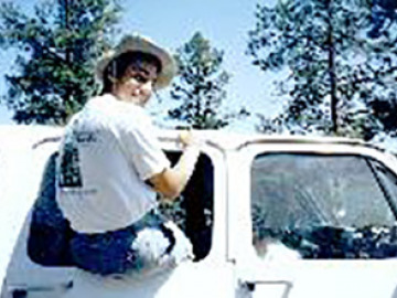 Jon, no doubt trying to retrieve duct tape from the roof of his van at 65 mph.