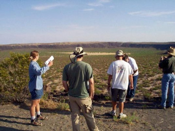 Day 2. After camping near Kilbourne Hole, Jani described this maar crater. In this kind of crater, hot magma wells upwards into the saturated water table and generates large amounts of pressurized, superheated steam that explodes in all directions.