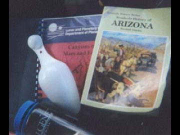 When setting out on a Field Trip, it's important to have the right kind of supplies: water bottle, Roadside History of Arizona, Field Trip Guide, and the Ice Scoop.