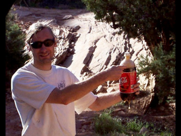 In the process of getting all those vehicles over that hill there had been a whole lot of shaking going on. Werner displays how much foam his Coke had gotten as it bounced around the bed of the truck. Werner was great at pointing things out on that trip.