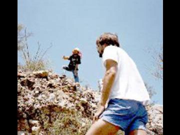 Will points out broken up rock at a central Arizona landslide.