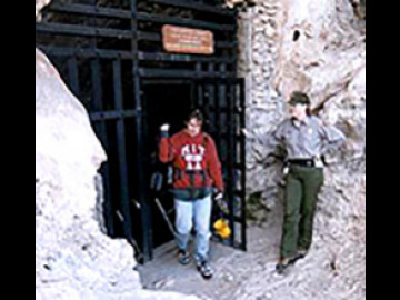 Zibi and our ranger leave the cave entrance.