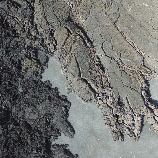 A view from the UAV showing the complexity of the lava flow margin, which includes several finger-like lobes with differing surface texture.