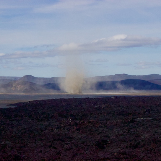 Even on clear days, winds could be high and generate large dust devils like this one.