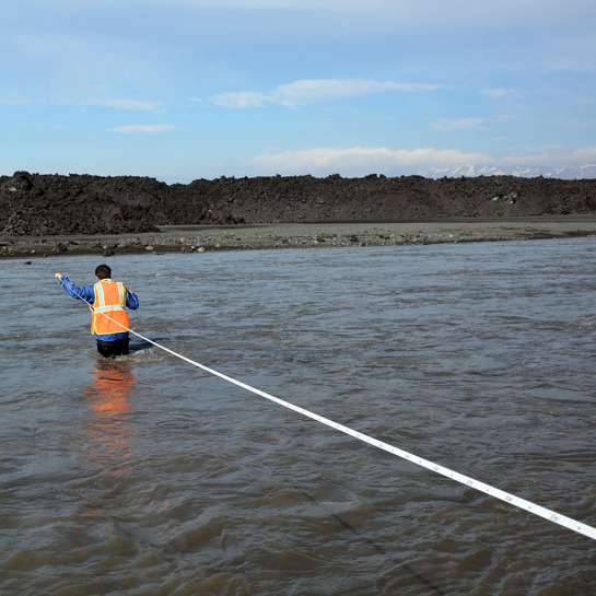 Despite having so many high-tech instruments, sometimes the best way to take a measurement was the old-fashioned way, with a tape measure (even if it means wading across a river!).
