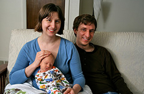 David and Juliet pose with their newborn baby, Leo Alexander