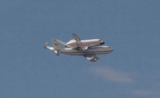 Close-up of the Space Shuttle Endeavour piggy-backing on a 747 aircraft.