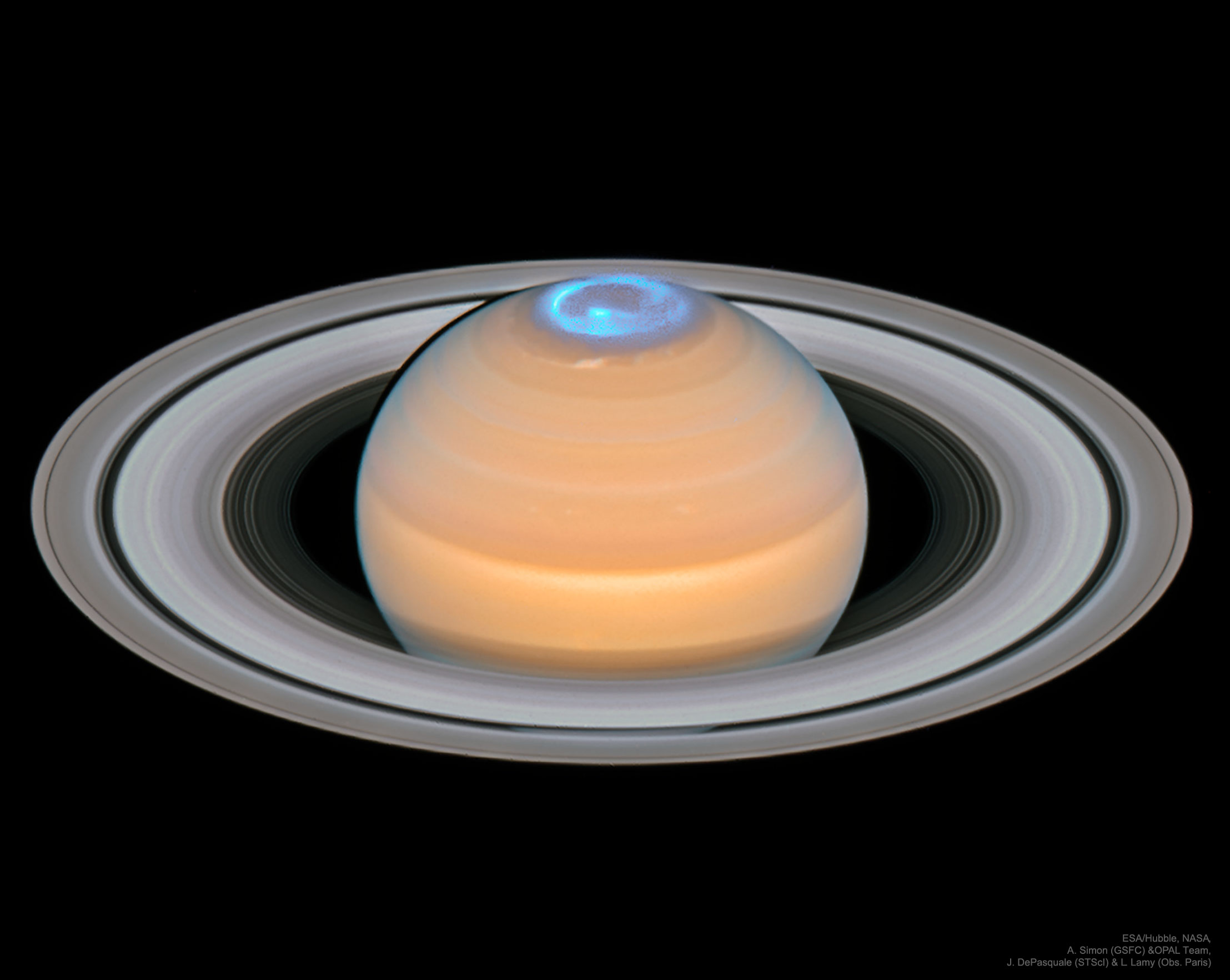 Saturn and it's aurora. (Image: NASA)