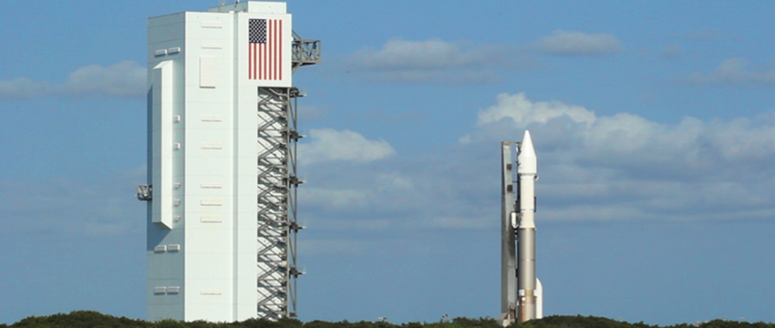 The Atlas V rocket carrying the OSIRIS-REx spacecraft was rolled out Wednesday morning from the Vertical Integration Facility (left) to Space Launch Complex 41 at Cape Canaveral, Florida. (Photo: Bob Demers/UANews)