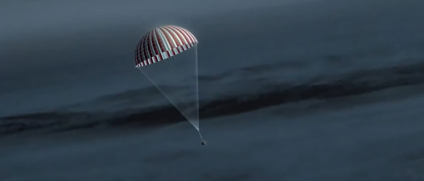 OSIRIS-REx sample capsule parachutes down to Earth.