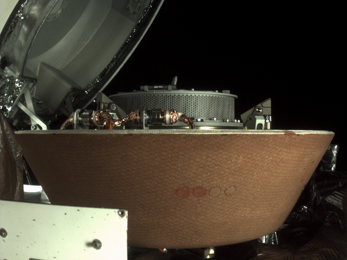 Taken on Oct. 28 by NASA's OSIRIS-REx spacecraft, this image shows the collector head after it was separated from the Touch-And-Go Sample Acquisition Mechanism arm. The collector head is secured onto the capture ring in the Sample Return Capsule. NASA/Goddard/University of Arizona/Lockheed Martin