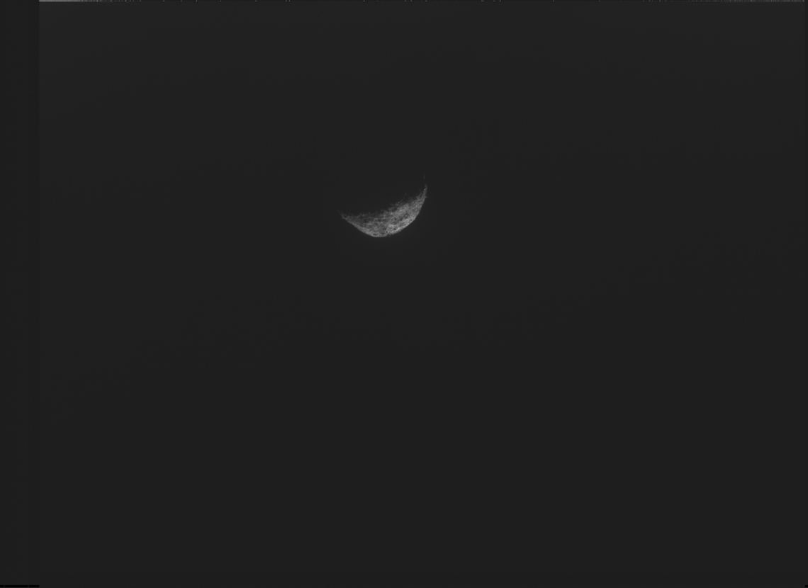 This image, the last one taken by the spacecraft, shows crescent Bennu with its night side melting with the complete black of space as the spacecraft pushed away from Bennu. The photo was taken with NavCam, one of three camera instruments designed and built by Malin Space Systems. NASA/Goddard/University of Arizona/Lockheed Martin