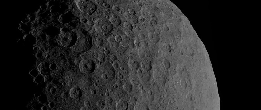 Ceres is a dwarf planet that orbits the sun between Mars and Jupiter. In this image, Ahuna Mons can be seen in the bottom right of Ceres's profile. 