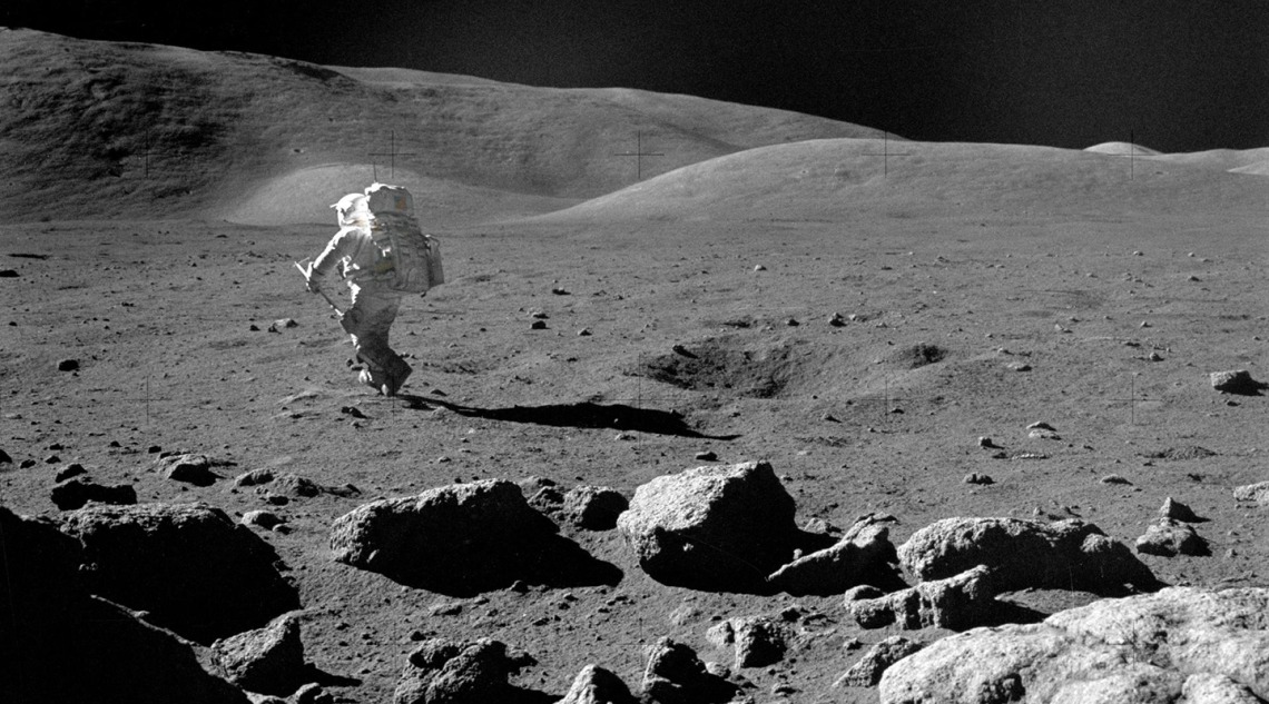 Astronaut walking on the moon.