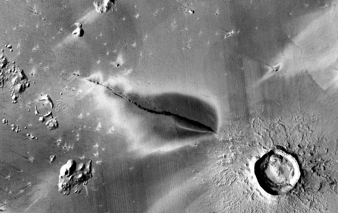 Recent explosive volcanic deposit around a fissure of the Cerberus Fossae system. NASA/JPL/MSSS/The Murray Lab