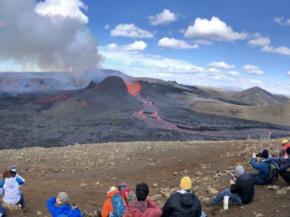 People watching Icelandic volcano eruption.