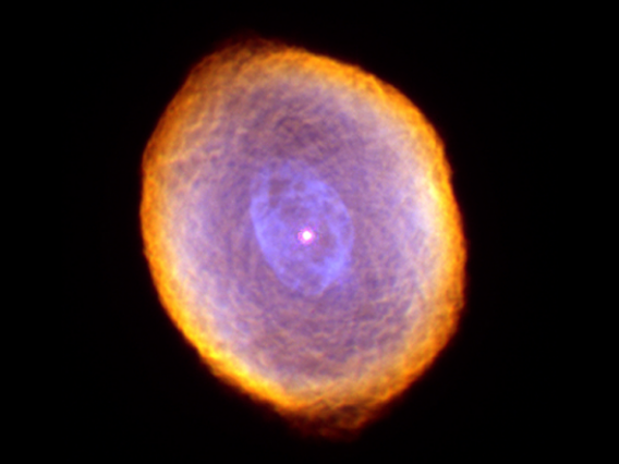 In this picture of the Spirograph Nebula, a dying star about 2,000 light-years from Earth, NASA's Hubble Space Telescope revealed some remarkable textures weaving through the star's envelope of dust and gas.