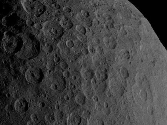 Ceres is a dwarf planet that orbits the sun between Mars and Jupiter. In this image, Ahuna Mons can be seen in the bottom right of Ceres's profile. 
