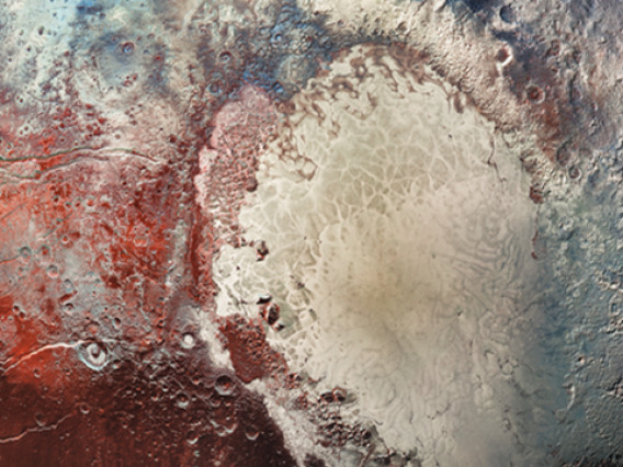 In this image of Pluto taken by NASA's New Horizons spacecraft, different colors represent different compositions of surface ices, revealing a surprisingly active body. (Image: NASA/Johns Hopkins University Applied Physics Laboratory/Southwest Research Institute)