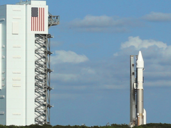 The Atlas V rocket carrying the OSIRIS-REx spacecraft was rolled out Wednesday morning from the Vertical Integration Facility (left) to Space Launch Complex 41 at Cape Canaveral, Florida. (Photo: Bob Demers/UANews)