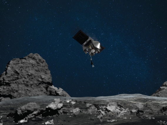 This artist's rendering shows the descending OSIRIS-REx spacecraft as it would have looked like to an observer standing on the surface of asteroid Bennu during the matchpoint rehearsal.NASA/Goddard/University of Arizona
