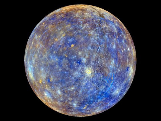 A cratered planetary surface with bluer and yellower hughes representing different compositions